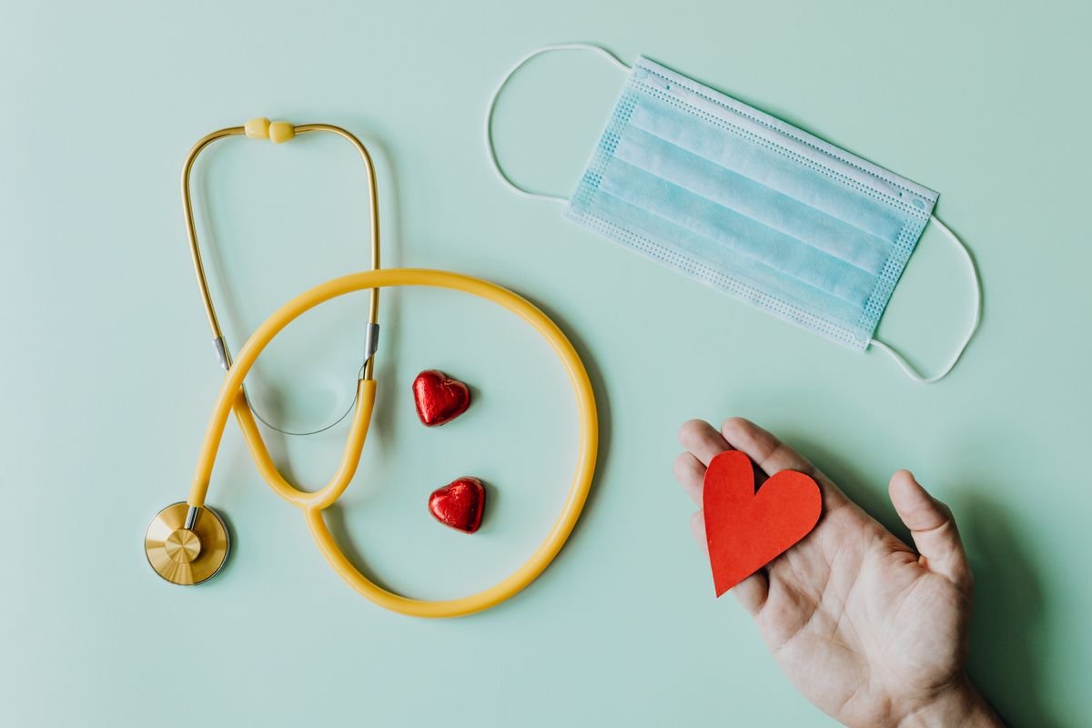 Personal protective mask and stethoscope on a table